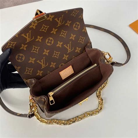 lv pochette metis east west